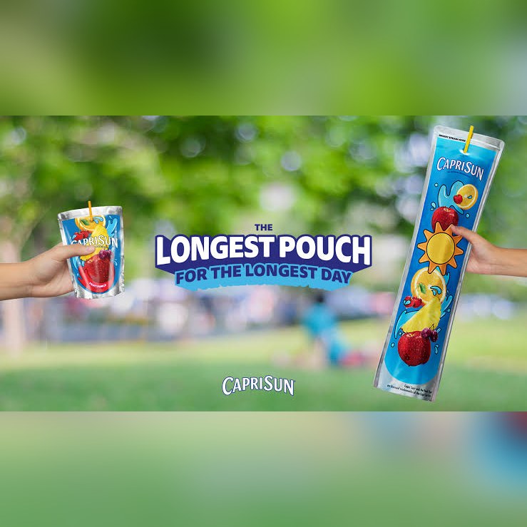 A normal Capri Sun pouch beside an extra-long one: The Longest Pouch for the Longest Day